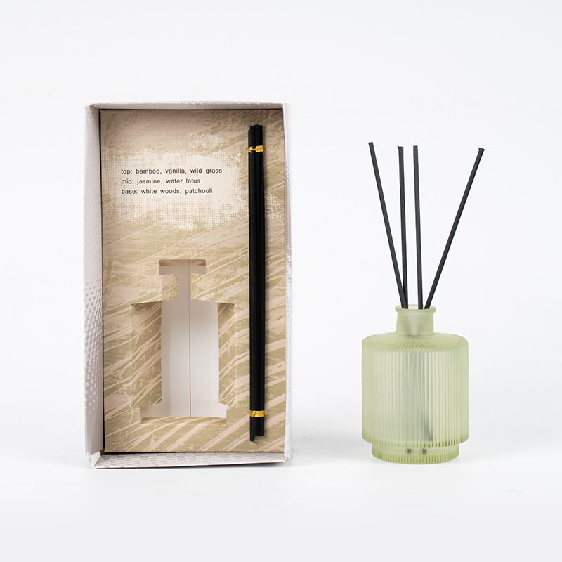 Circular vertical stripe transparent glass bottle reed diffuser-home scent reed diffuser manufacturer